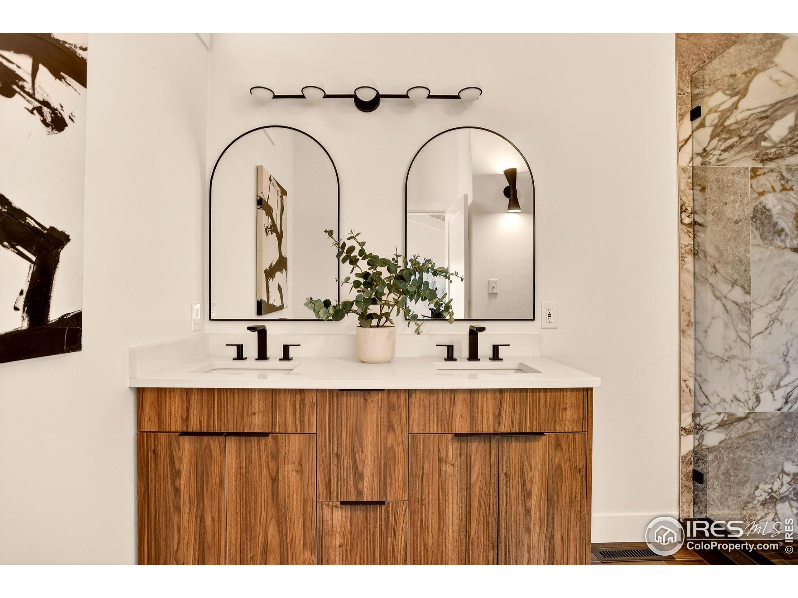 1138 Timber Lane Boulder, CO 80304 - Photo 16 of 21 a bathroom with a sink and a mirror