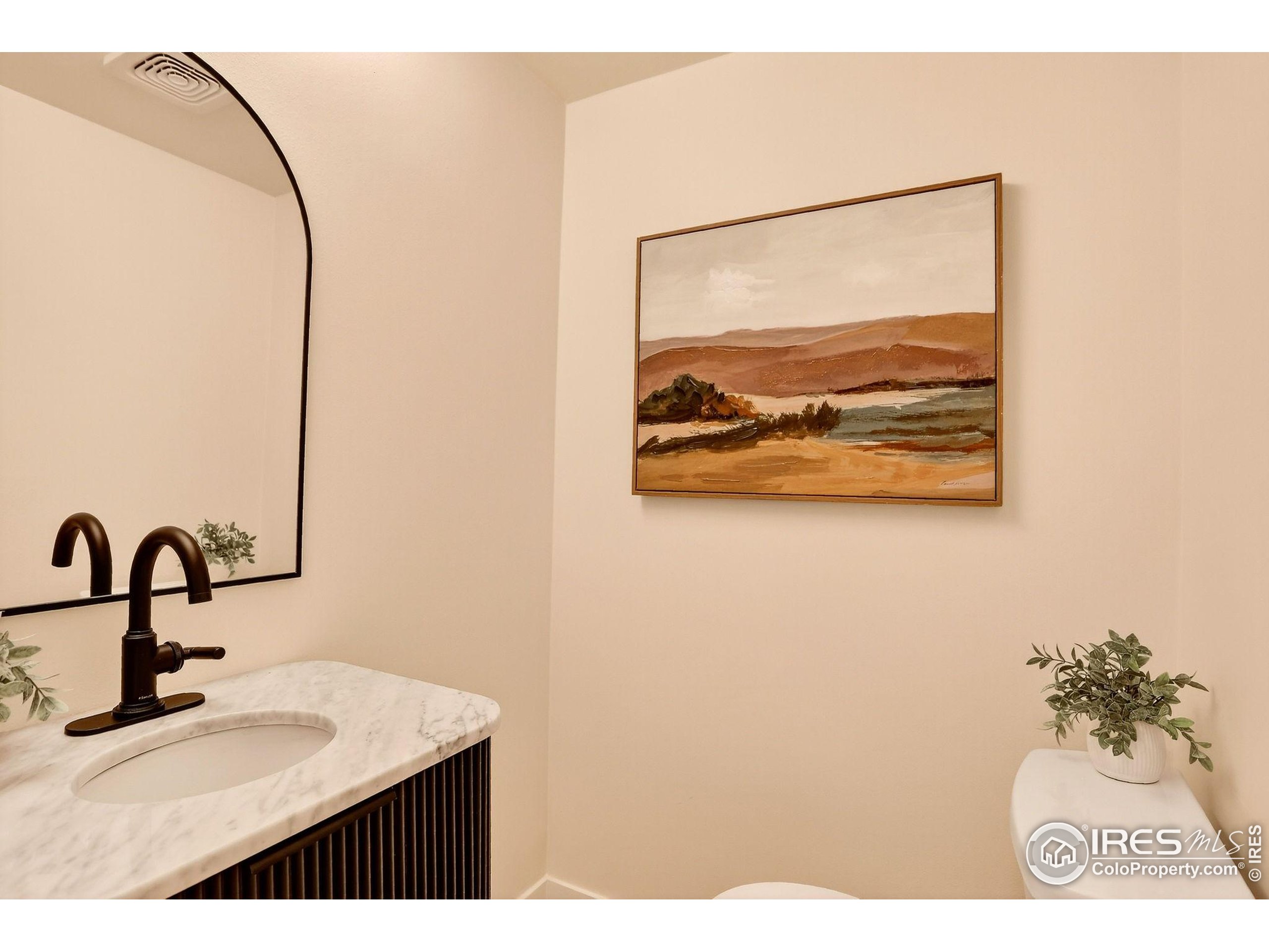 1138 Timber Lane Boulder, CO 80304 - Photo 19 of 21 a bathroom with a sink and a mirror