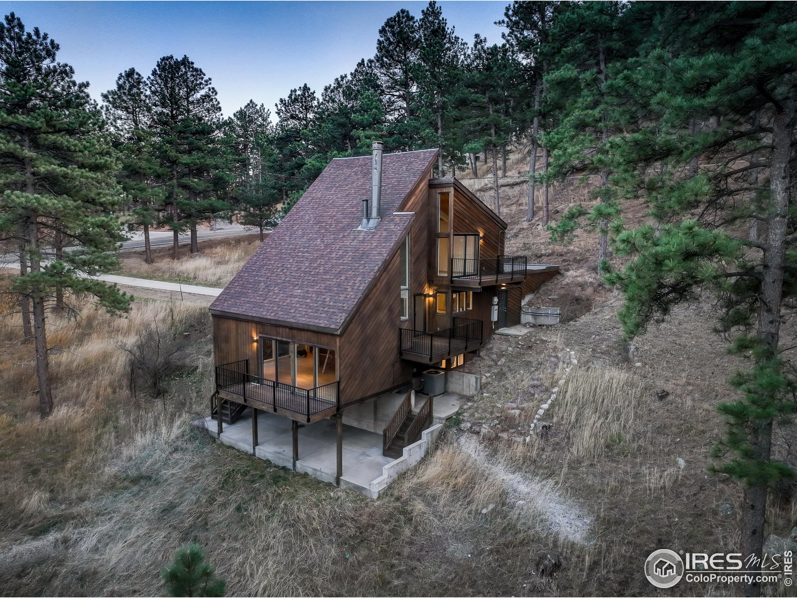 1138 Timber Lane Boulder, CO 80304 - Photo 20 of 21 a aerial view of a house with a yard