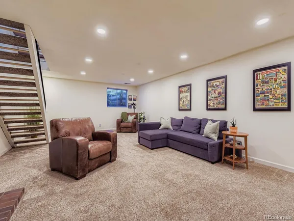 a living room with furniture and a couch