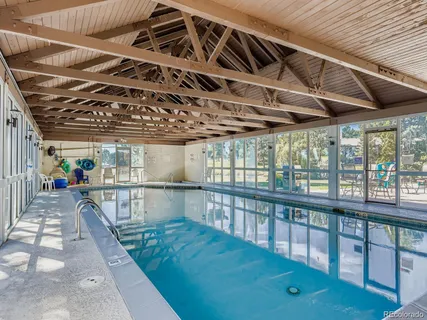 a picture of a bench in front of a wall