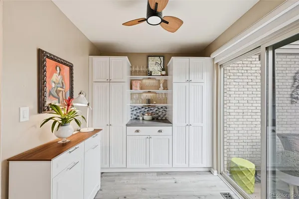 a kitchen with stainless steel appliances a refrigerator and a stove