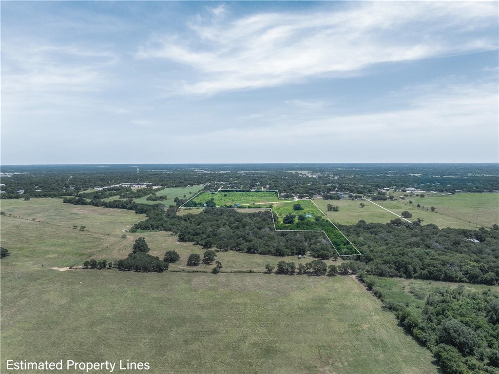801 Allison Avenue Groesbeck, TX 76642 - Photo 6 of 9 an aerial view of a houses with ocean view