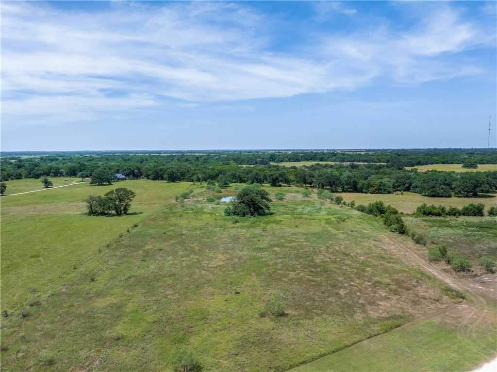 801 Allison Avenue Groesbeck, TX 76642 - Photo 7 of 9 a view of a lake with houses in the back