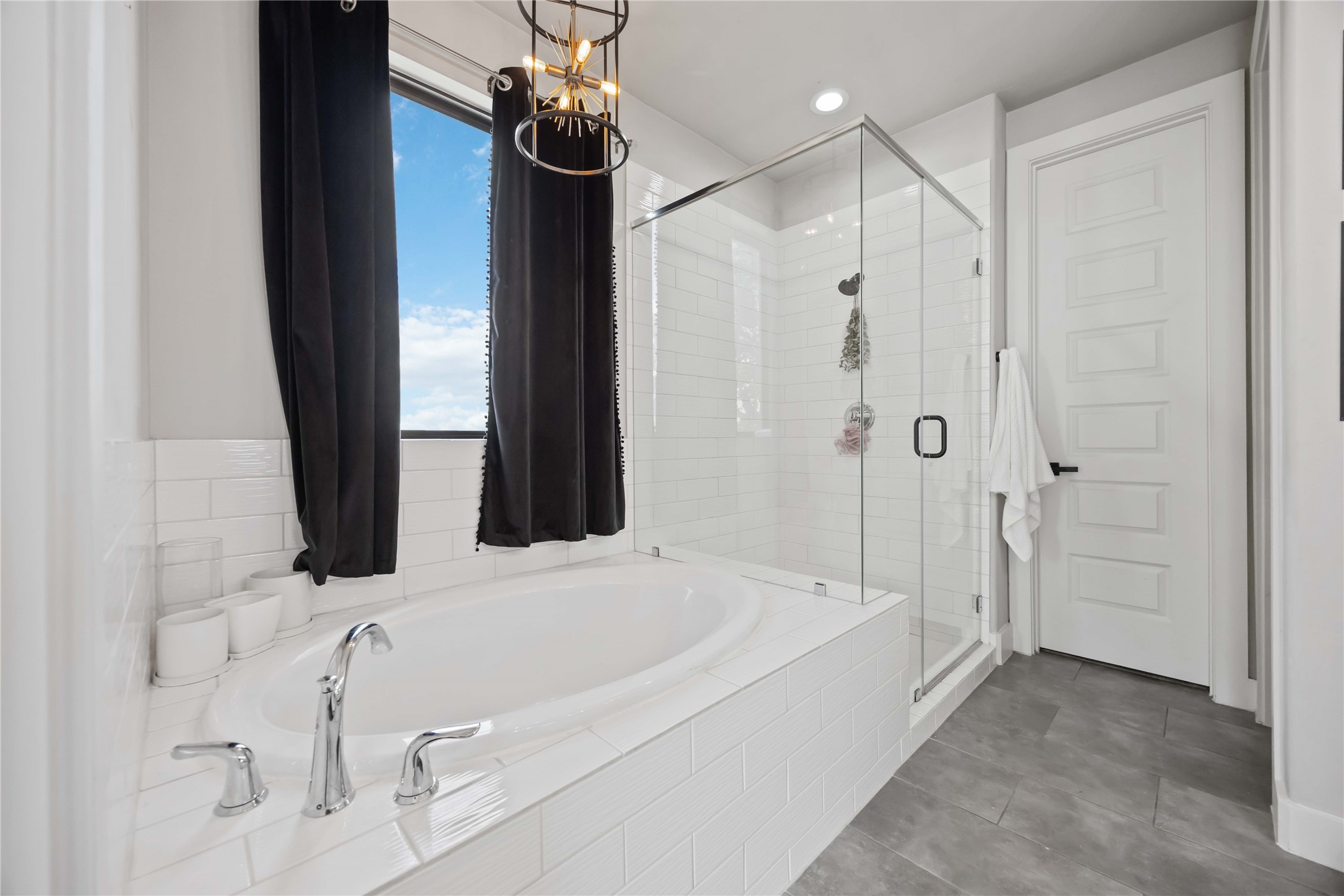 4235 Allen Street Houston, TX 77007 - Photo 15 of 23 a bathroom with a bathtub and a shower
