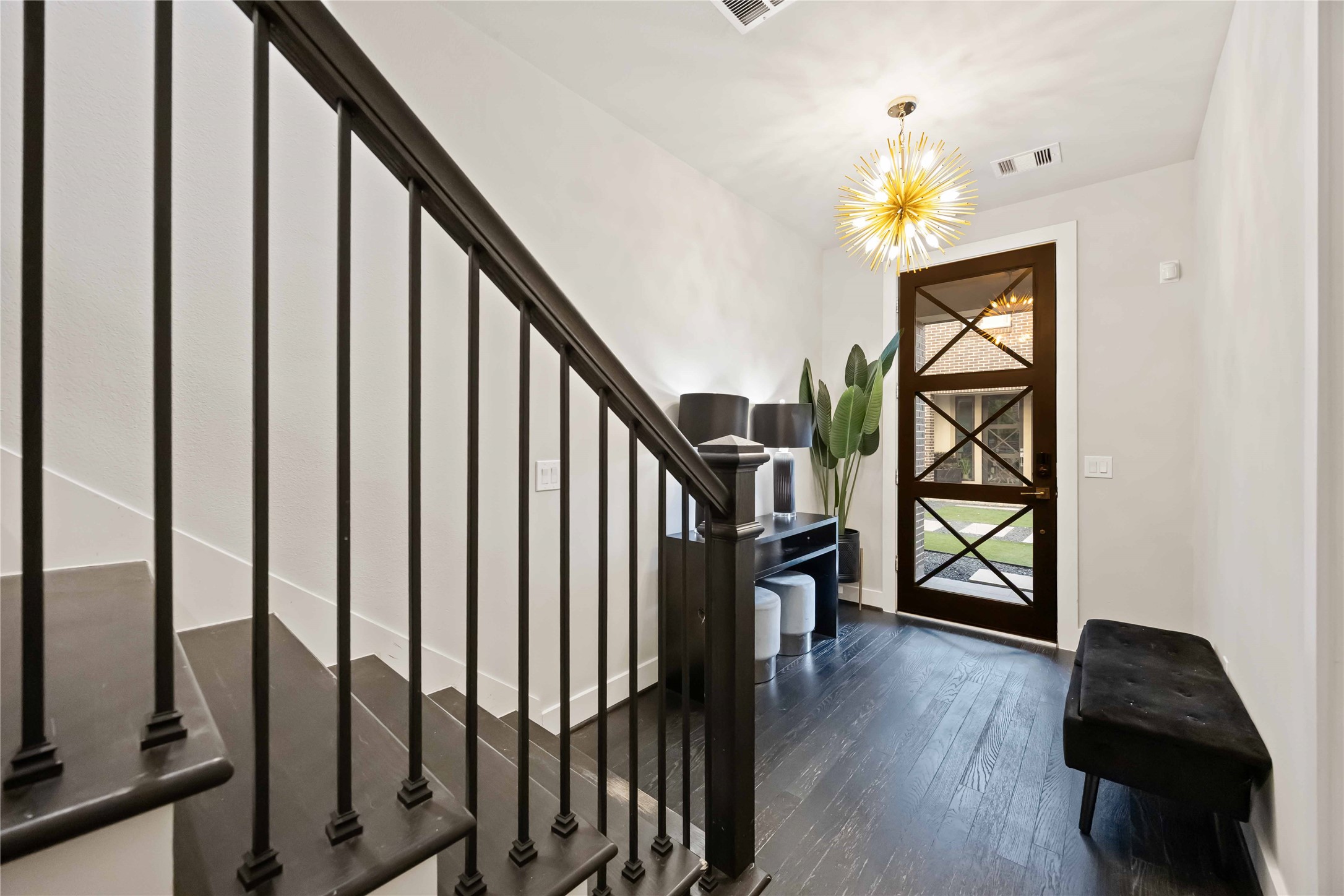 4235 Allen Street Houston, TX 77007 - Photo 2 of 23 a view of an entryway wooden floor and stairs