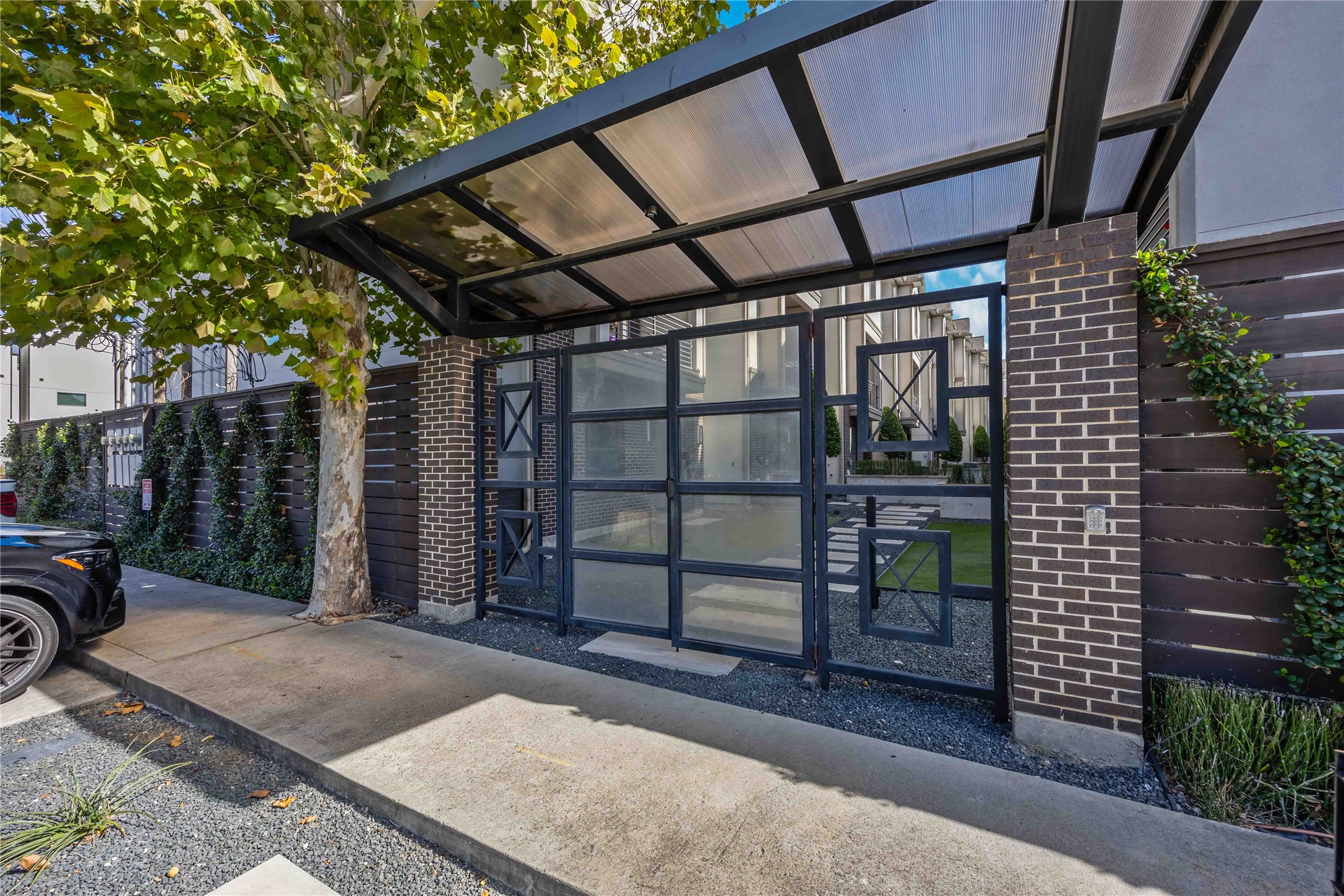 4235 Allen Street Houston, TX 77007 - Photo 23 of 23 a view of a porch with a table and chairs