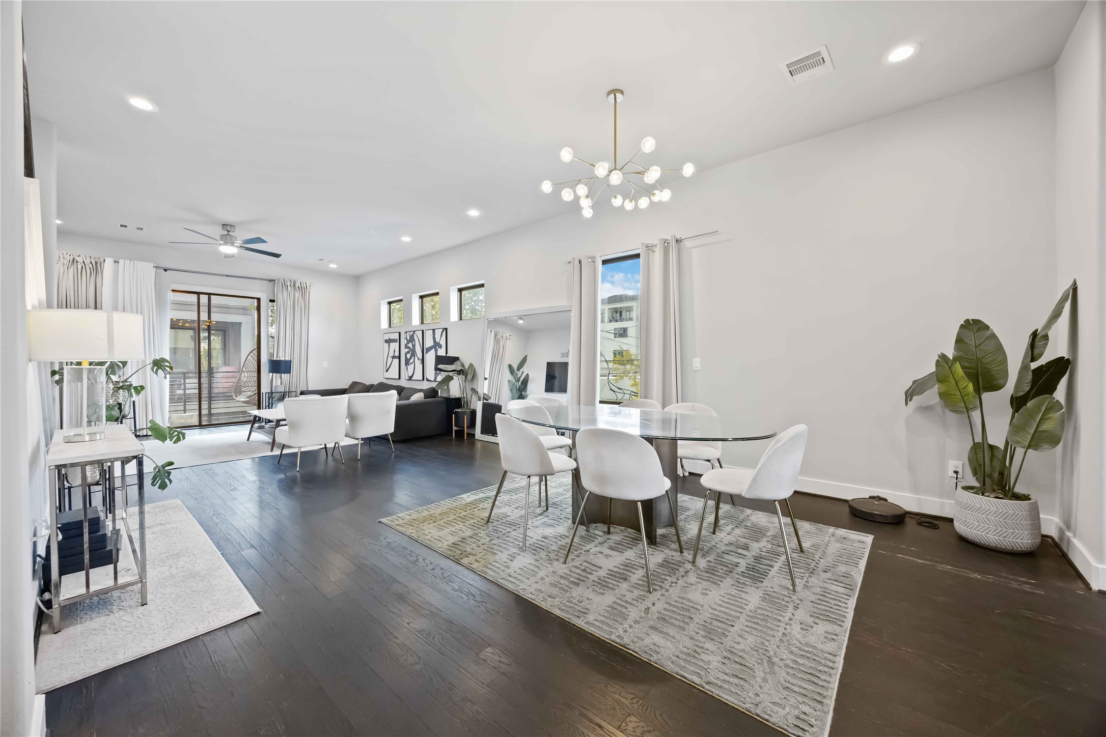 4235 Allen Street Houston, TX 77007 - Photo 10 of 23 a view of a dining room with furniture and wooden floor