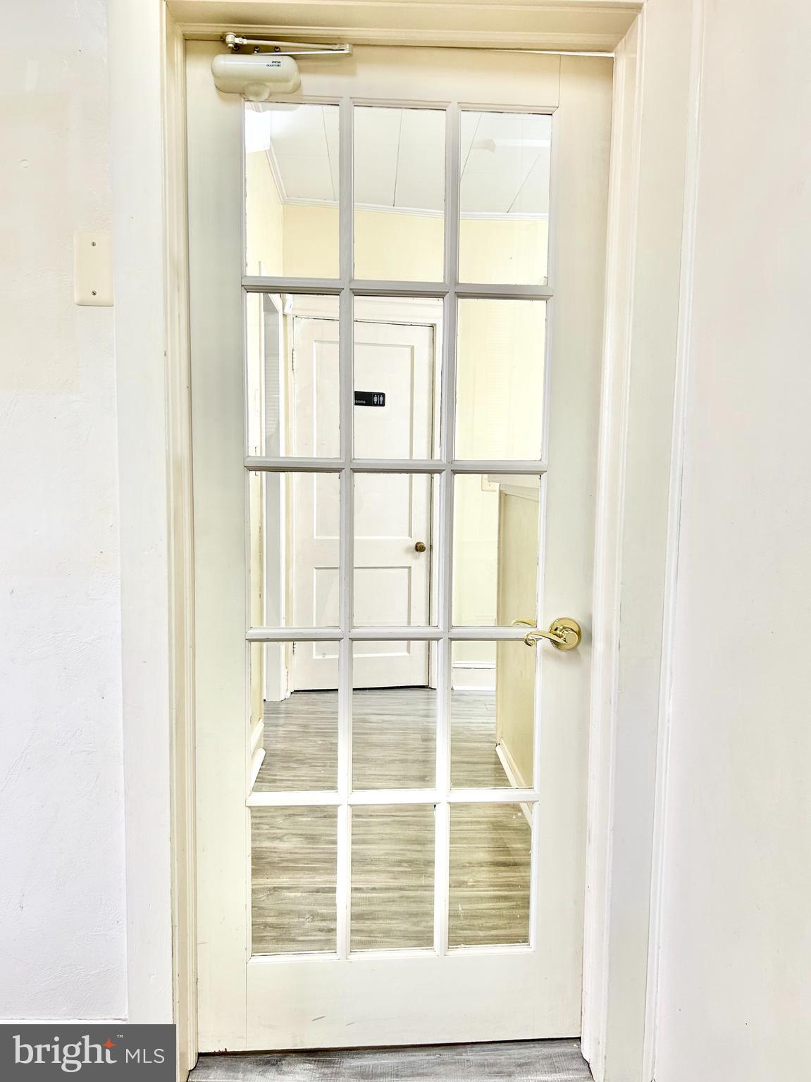 5904 Harford Road Baltimore, MD 21214 - Photo 12 of 23 a view of a window in a room