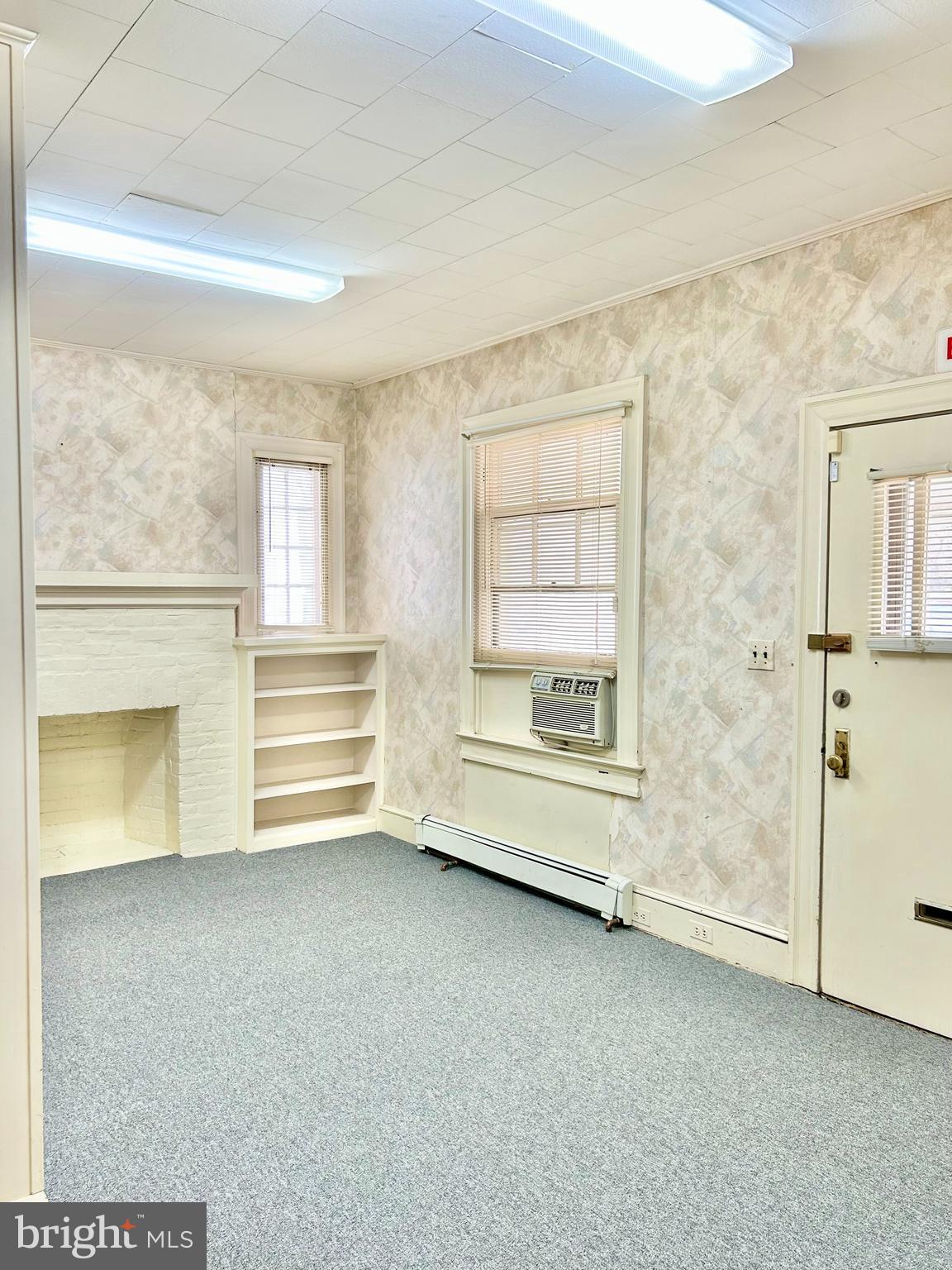 5904 Harford Road Baltimore, MD 21214 - Photo 18 of 23 an empty room with windows