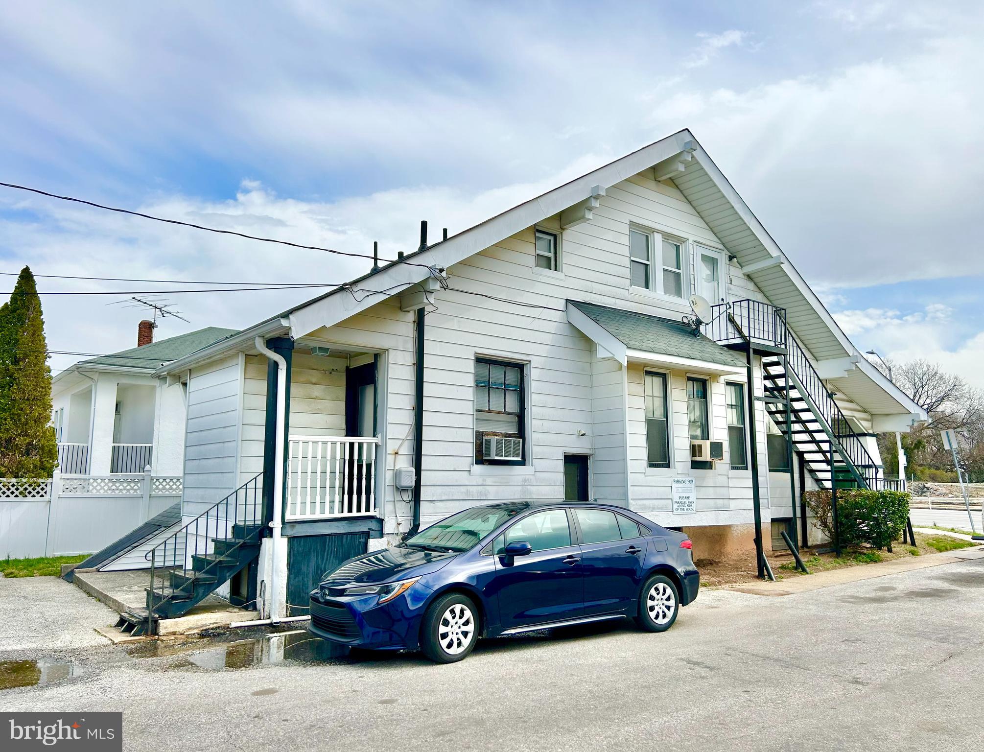 5904 Harford Road Baltimore, MD 21214 - Photo 21 of 23 a front view of a house with parking space