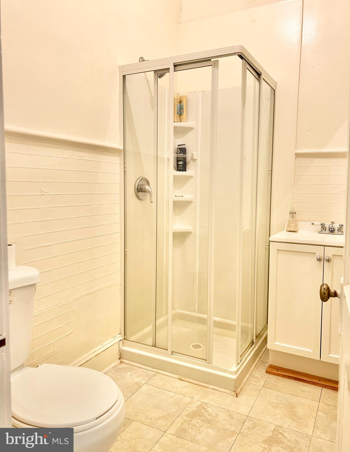 5904 Harford Road Baltimore, MD 21214 - Photo 7 of 23 a bathroom with a shower
