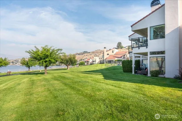 a view of a house with a big yard