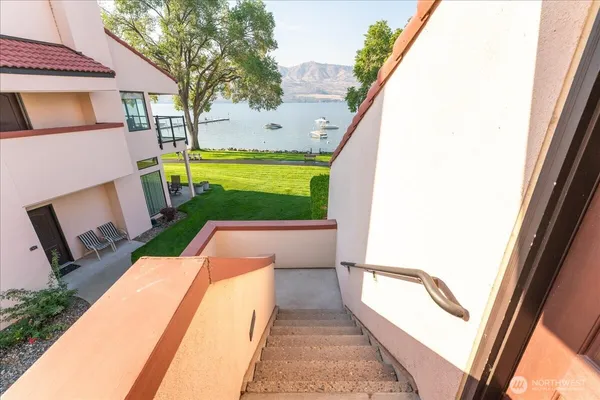 a view of swimming pool with a yard