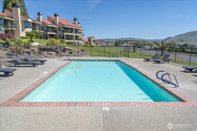 a view of a town with an ocean view