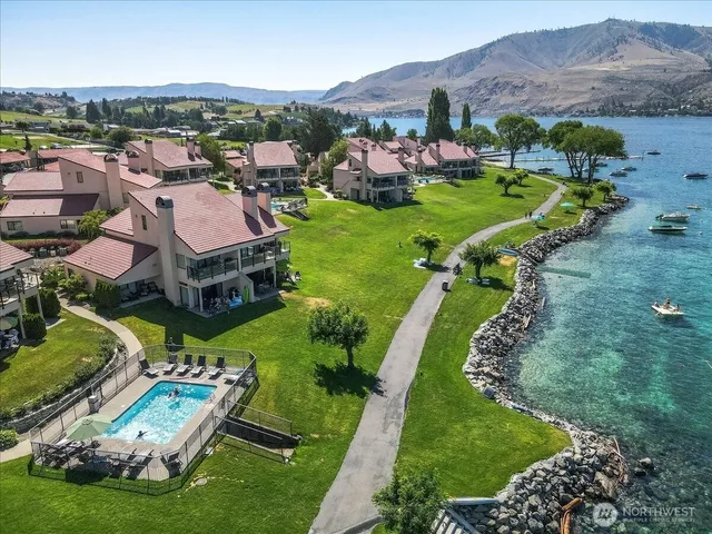 a view of a field with an ocean