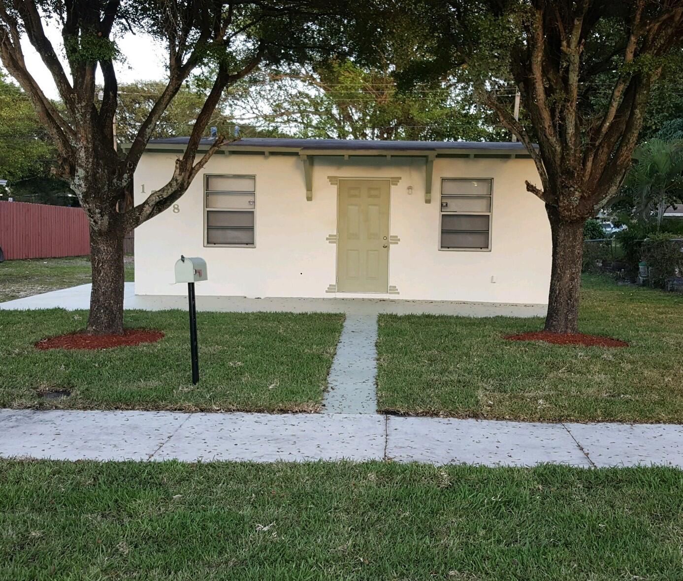 1548 Northwest 3rd Terrace Pompano Beach, FL 33060 - Photo 1 of 9 House Front copy