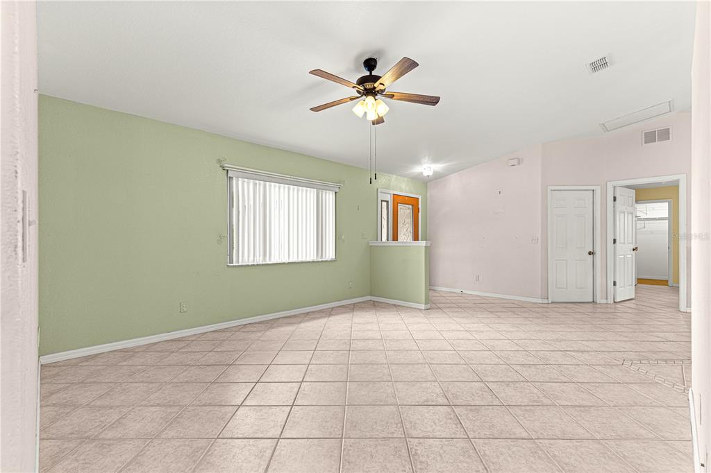 9958 Southwest 59th Circle Ocala, FL 34476 - Photo 5 of 56 a view of an empty room with a window