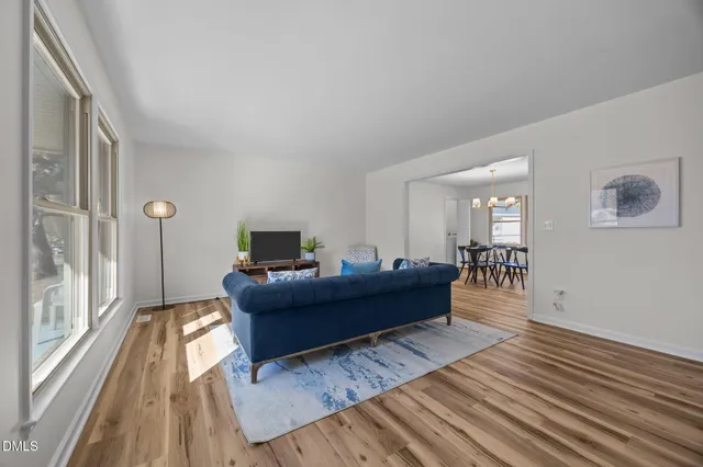a living room with a couch and a flat screen tv