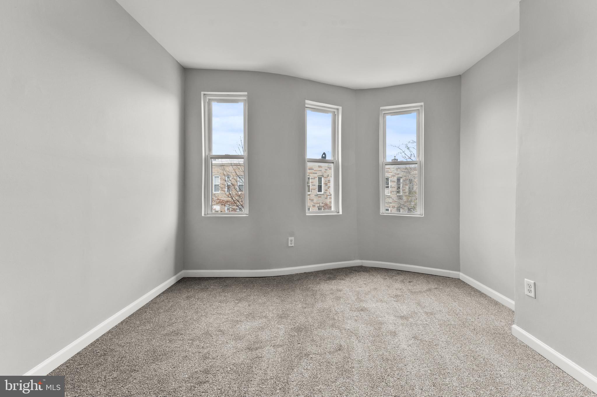 1249 Carroll Street Baltimore, MD 21230 - Photo 18 of 29 an empty room with windows