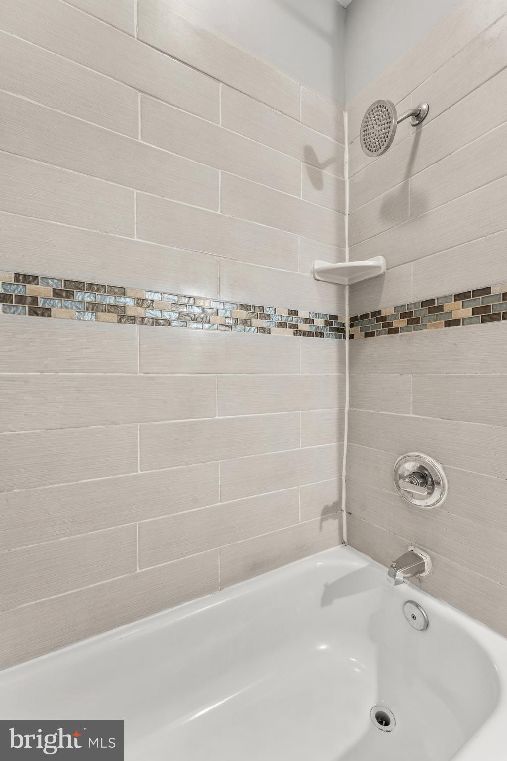 1249 Carroll Street Baltimore, MD 21230 - Photo 25 of 29 a bathroom with a tub and a shower