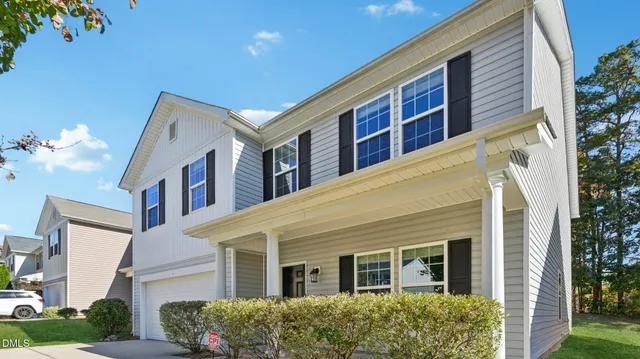 a view of a wooden door of the house