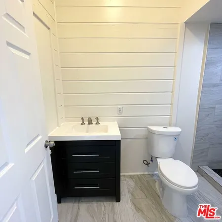 a bathroom with a sink and a toilet