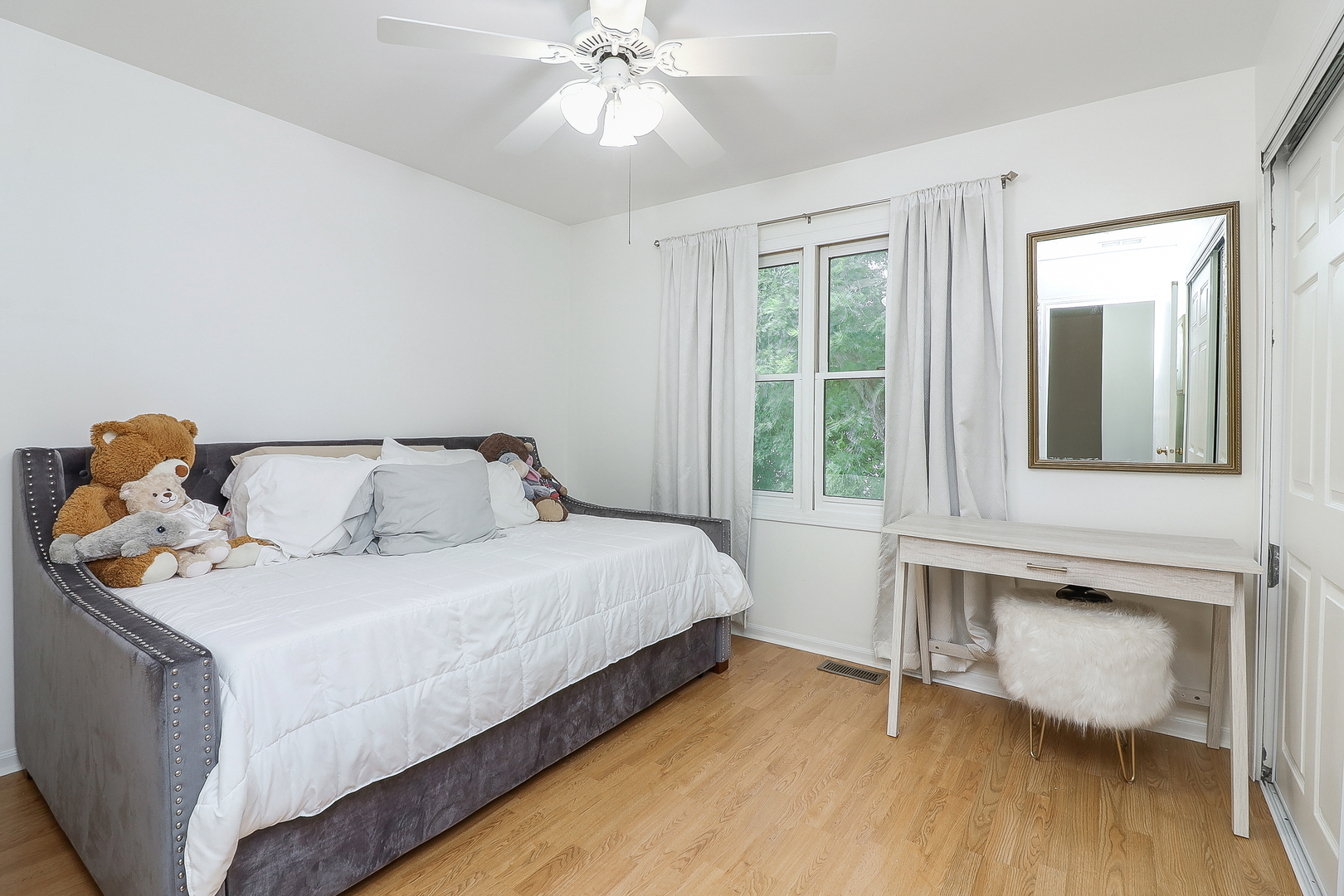 3 Hickory Oaks Court Bolingbrook, IL 60490 - Photo 15 of 21 a bedroom with a bed and wooden floor