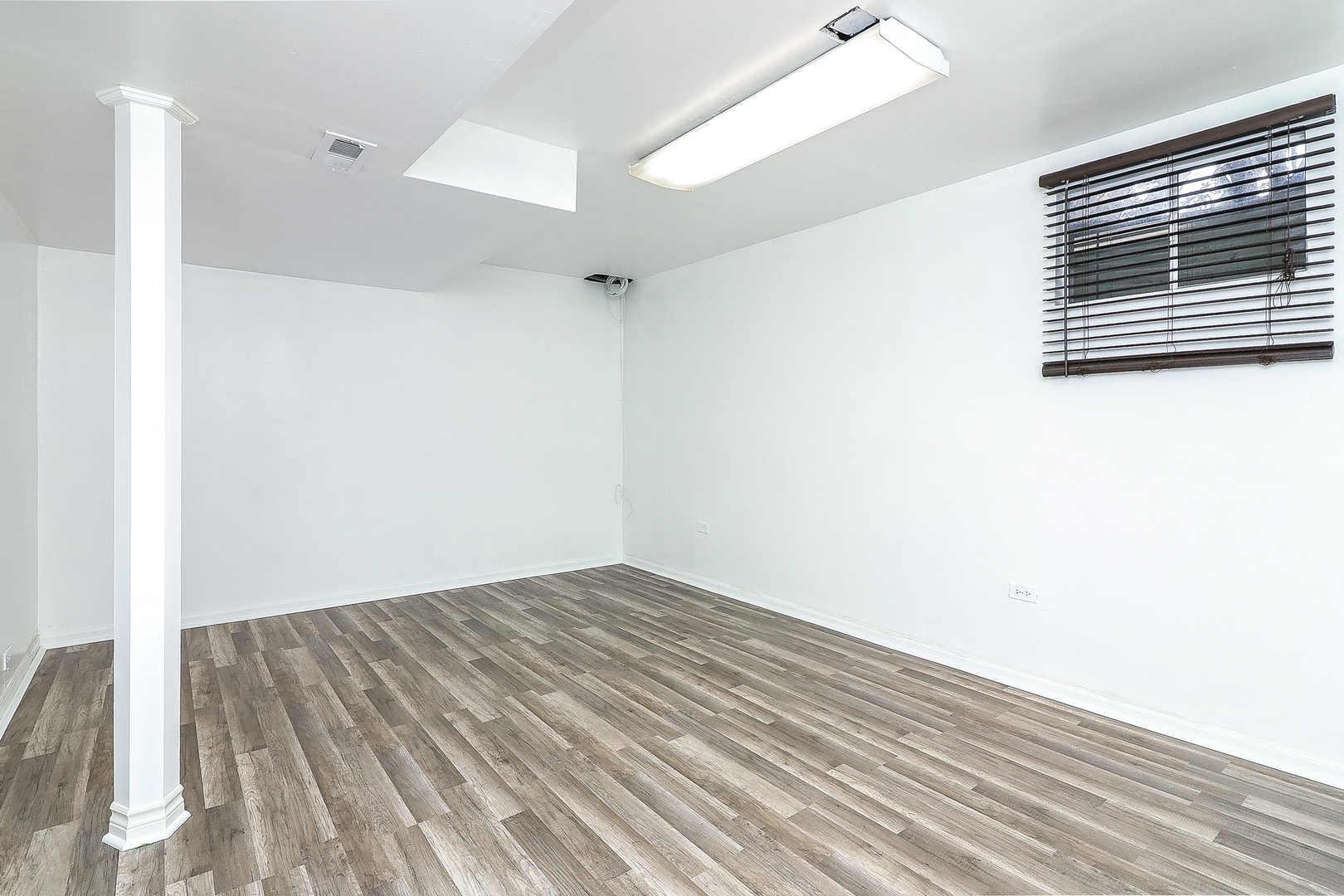 3 Hickory Oaks Court Bolingbrook, IL 60490 - Photo 18 of 21 a view of a room with wooden floor