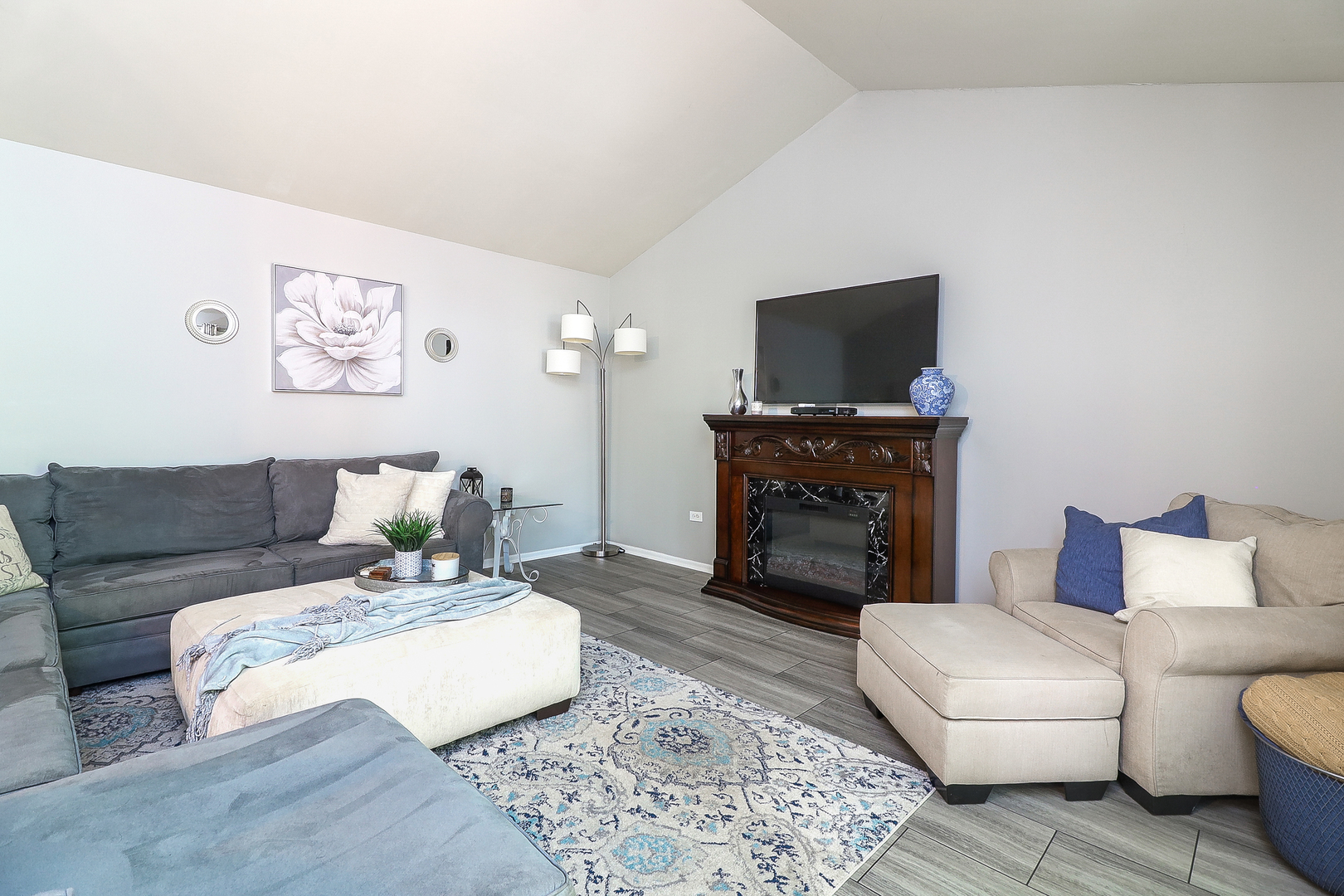 3 Hickory Oaks Court Bolingbrook, IL 60490 - Photo 10 of 21 a living room with furniture and a fireplace