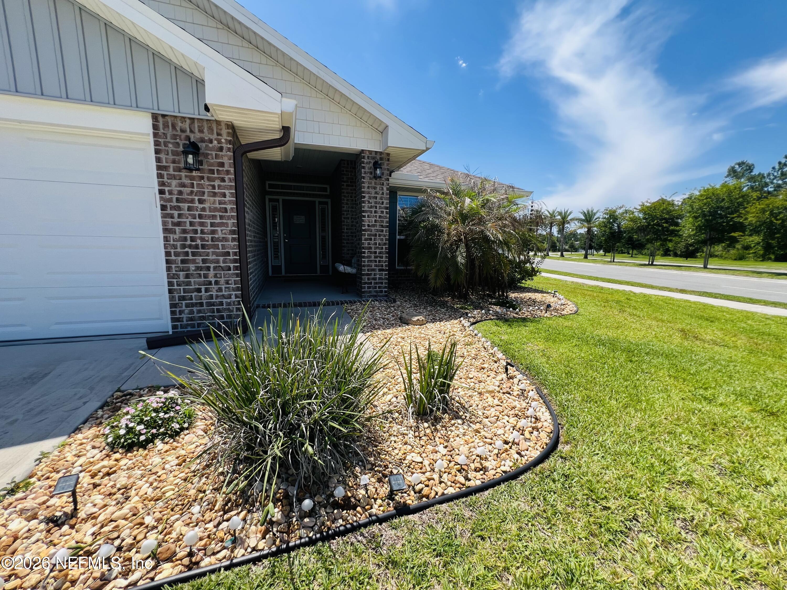 2 Rivertown Road Palm Coast, FL 32137 - Photo 17 of 80 a view of swimming pool having outdoor seating