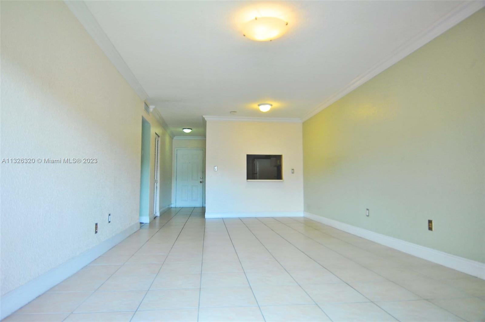 9972 Southwest 88th Street, Unit 1121 Miami, FL 33176 - Photo 2 of 7 a view of an empty room
