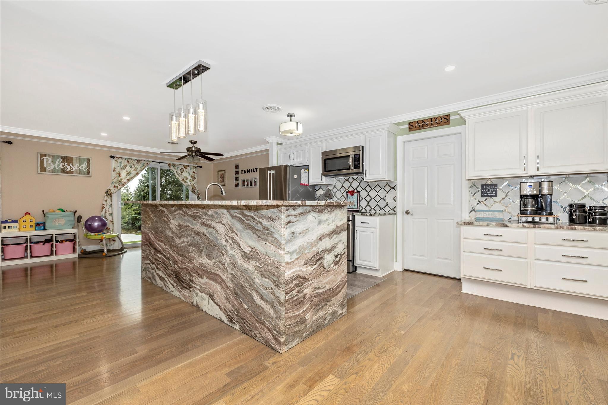 Kitchen with granite counters.