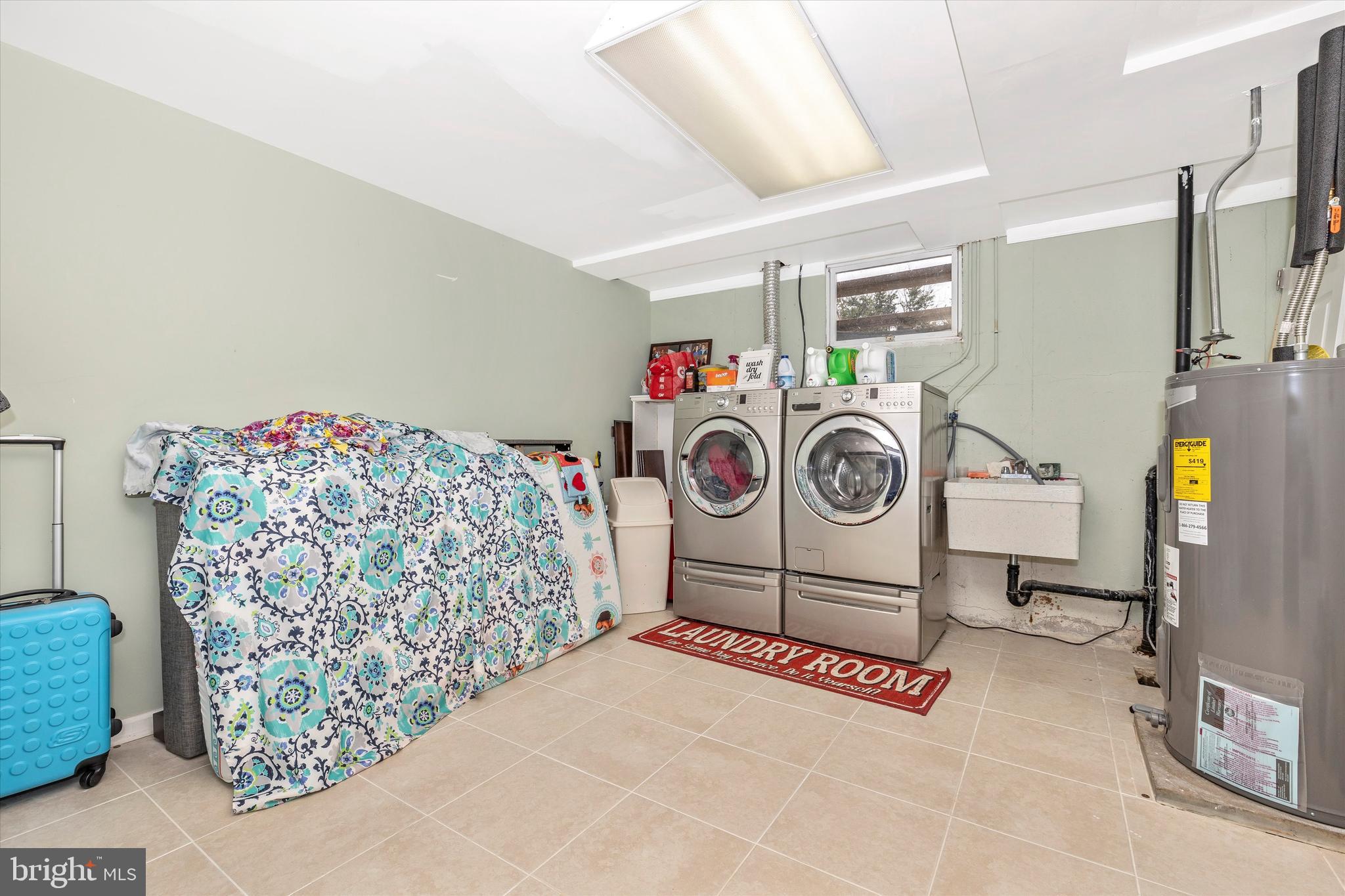 24317 Ridge Road Damascus, MD 20872 - Photo 36 of 52 Large laundry room!