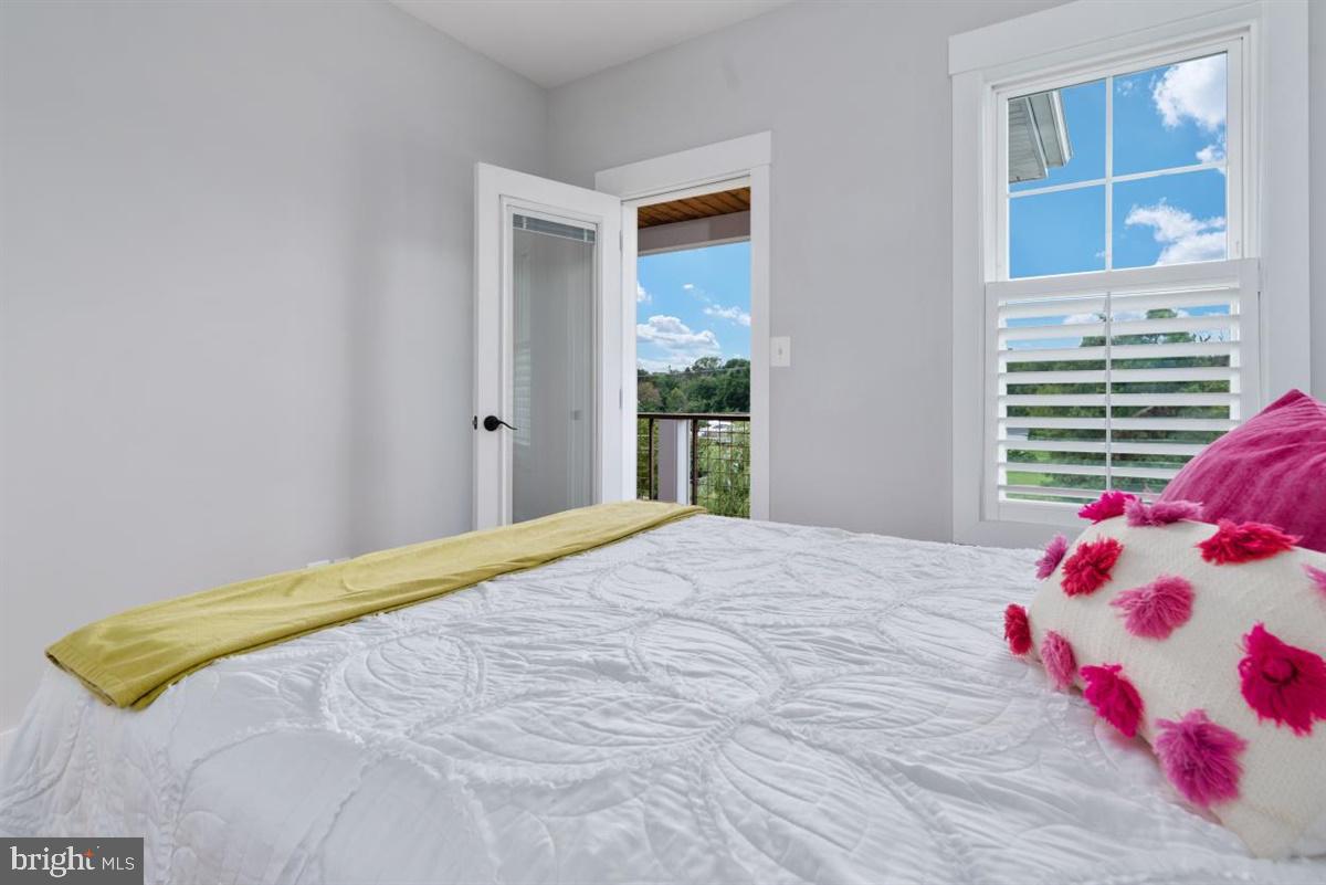 7829 SW Road Pasadena, MD 21122 - Photo 26 of 39 2nd Bedroom with Door to Streetside Deck