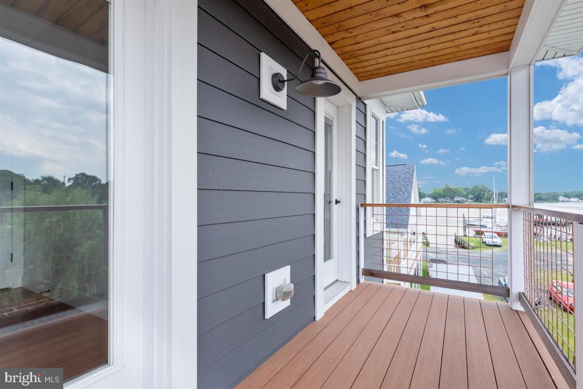 7829 SW Road Pasadena, MD 21122 - Photo 27 of 39 Streetside Deck with Views up Back Creek
