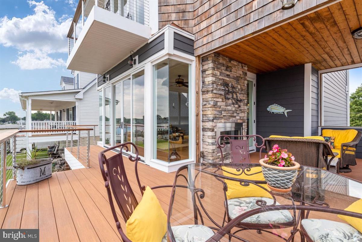 7829 SW Road Pasadena, MD 21122 - Photo 8 of 39 Wide Deck w Stainless Cable Railings and Posts