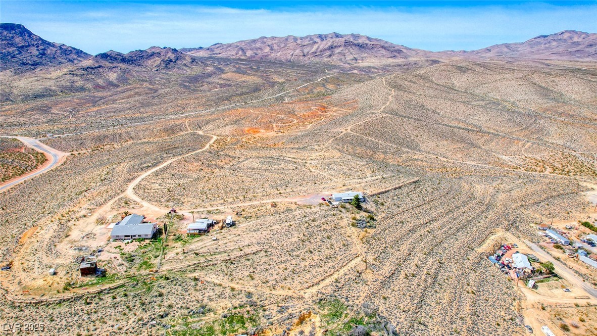 Beacon Street Jean, NV 89019 - Photo 5 of 25 Drone / aerial view featuring a mountain view, a d