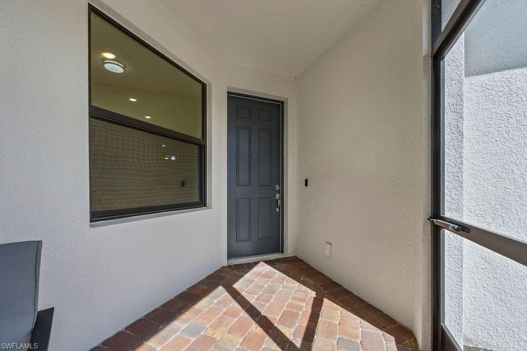 5931 Mayflower Way Ave Maria, FL 34142 - Photo 26 of 34 a view of an empty room