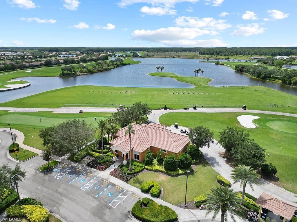 5931 Mayflower Way Ave Maria, FL 34142 - Photo 34 of 34 an aerial view of tennis court