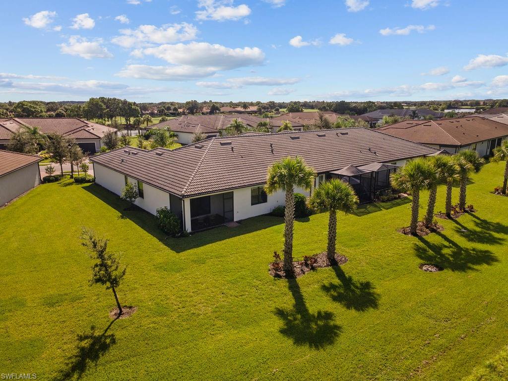 5931 Mayflower Way Ave Maria, FL 34142 - Photo 5 of 34 a view of a swimming pool with an ocean view