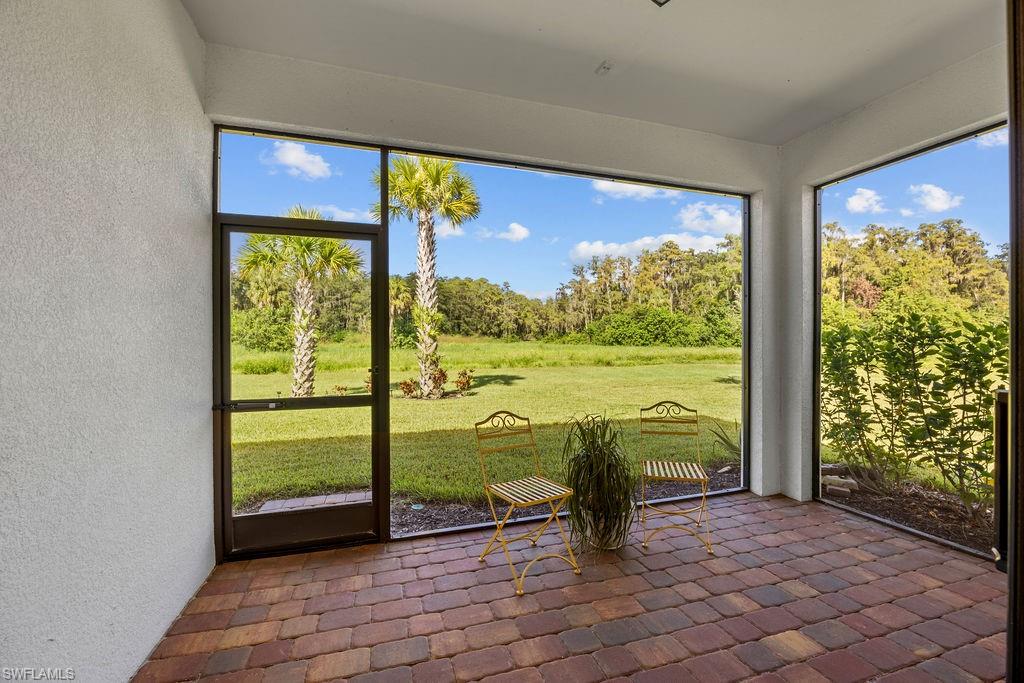 5931 Mayflower Way Ave Maria, FL 34142 - Photo 7 of 34 a view of a room with window