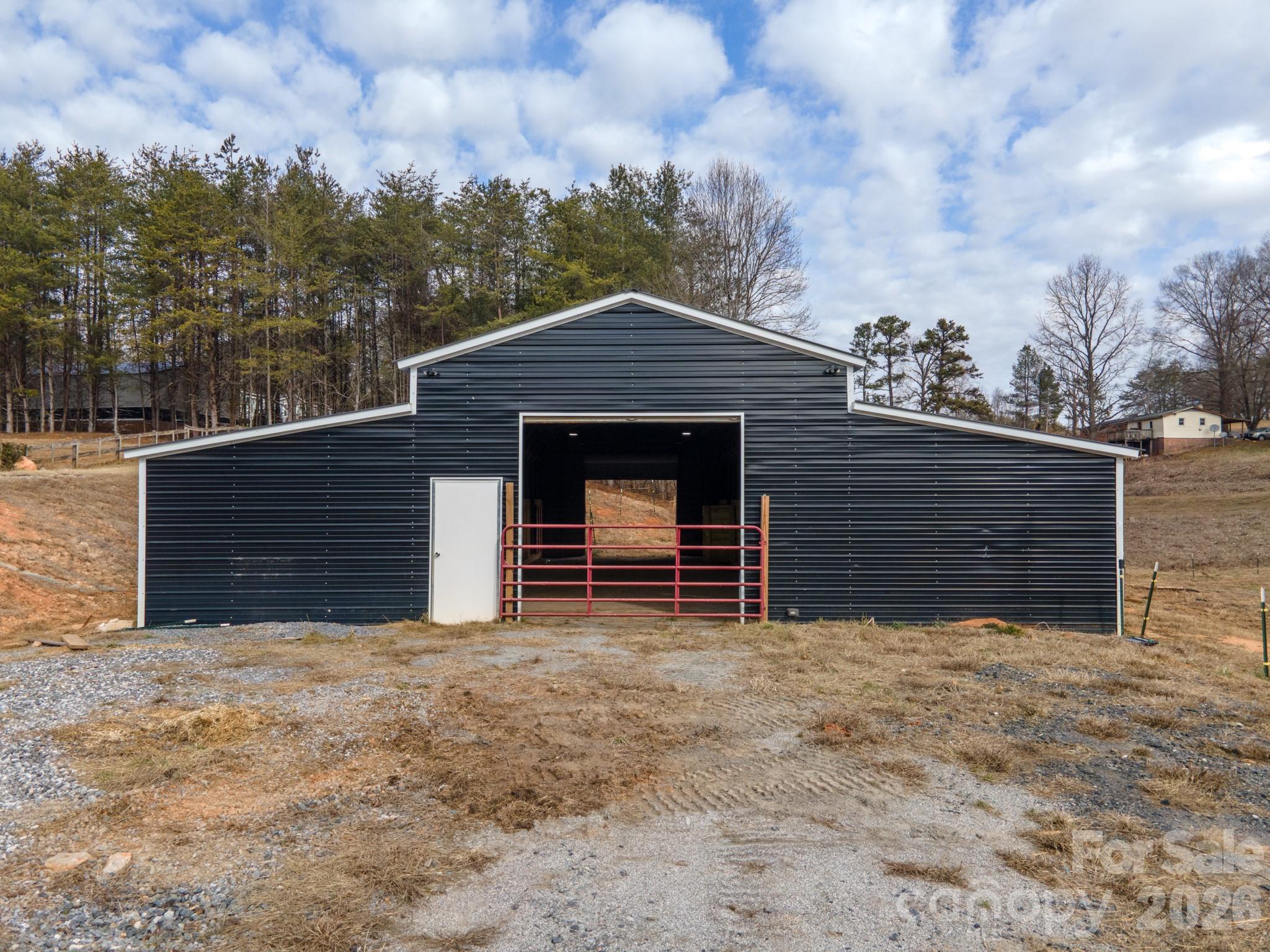 7400 Corn Hill Road Connelly Springs, NC 28612 - Photo 3 of 41 a front view of a house with a yard