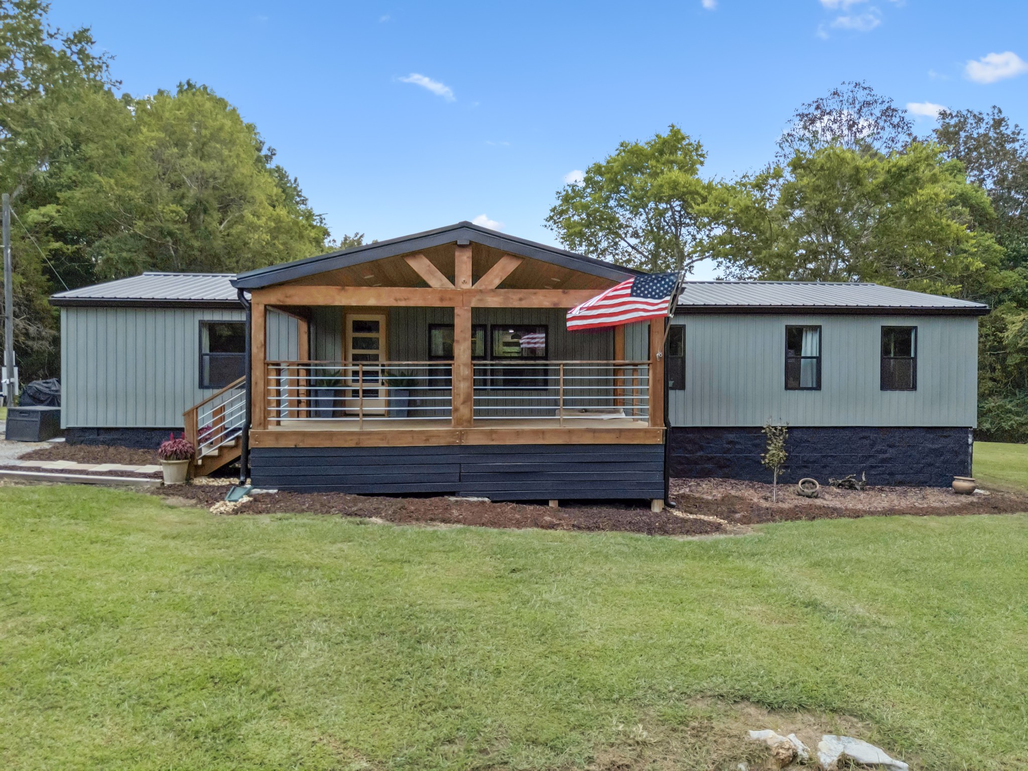 3680 Clark Road Lewisburg, TN 37091 - Photo 63 of 97 a front view of a house with a garden