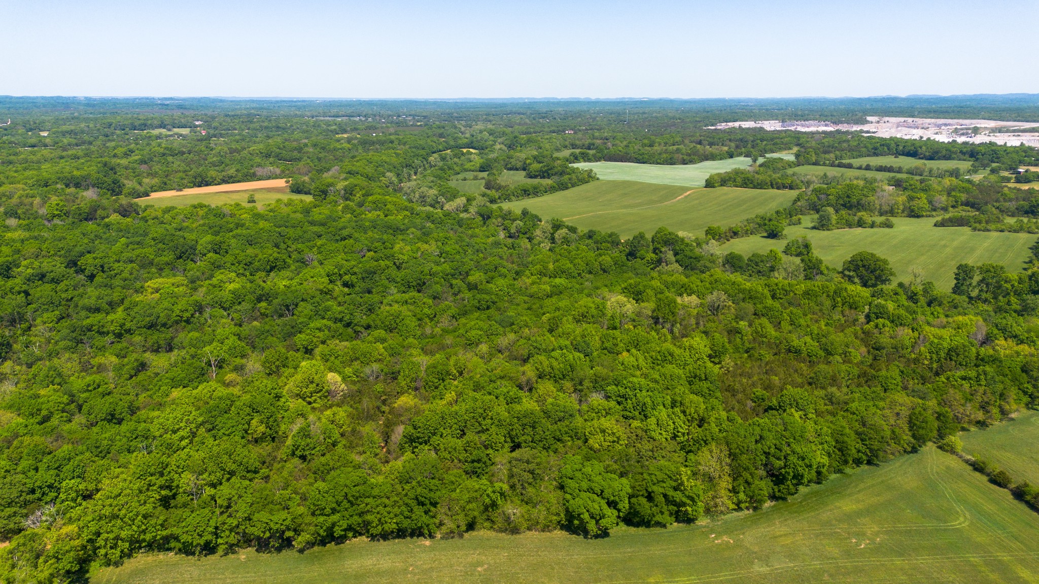 3680 Clark Road Lewisburg, TN 37091 - Photo 9 of 97 an aerial view of residential houses with outdoor space and trees all around