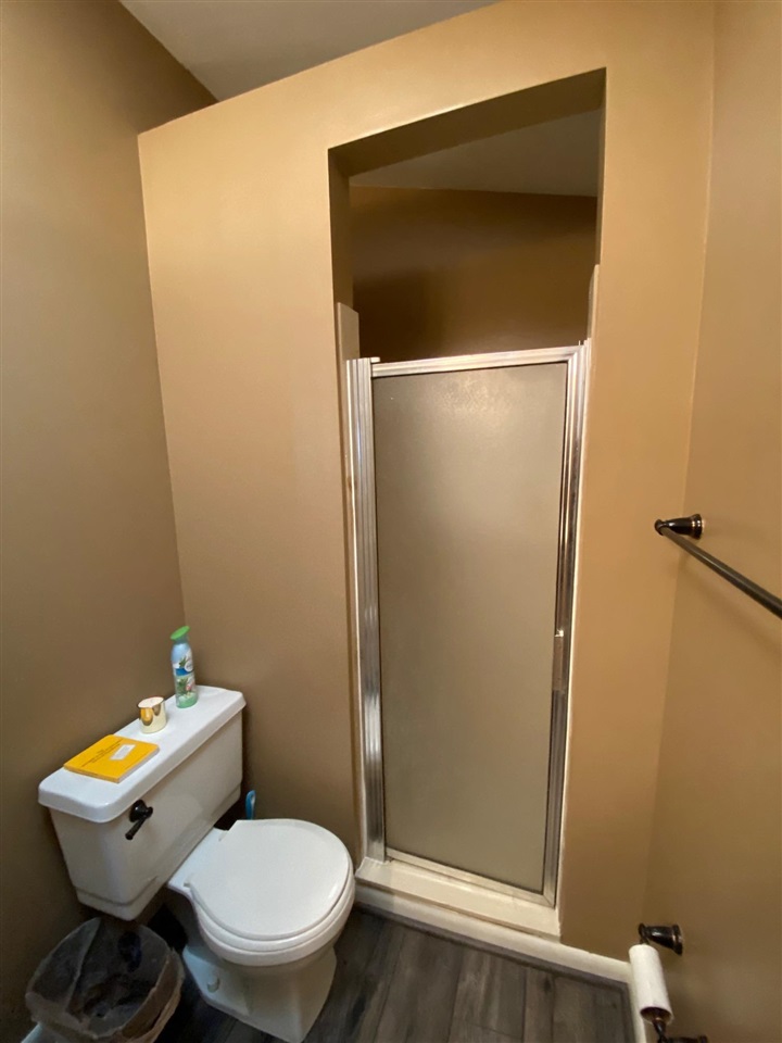1265 Whitewater Road Memphis, TN 38117 - Photo 16 of 23 a bathroom with a toilet and a shower