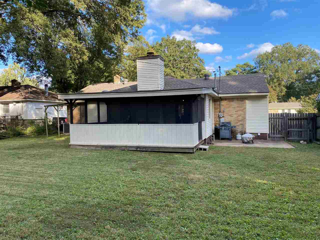 1265 Whitewater Road Memphis, TN 38117 - Photo 20 of 23 a view of a house with backyard and sitting area