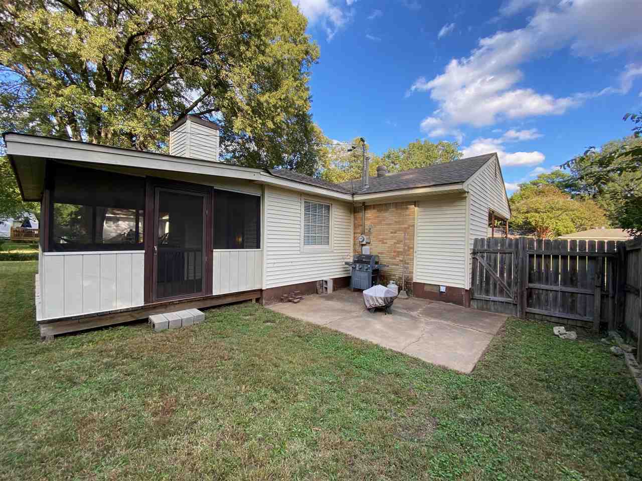 1265 Whitewater Road Memphis, TN 38117 - Photo 21 of 23 a view of a house with backyard and sitting area