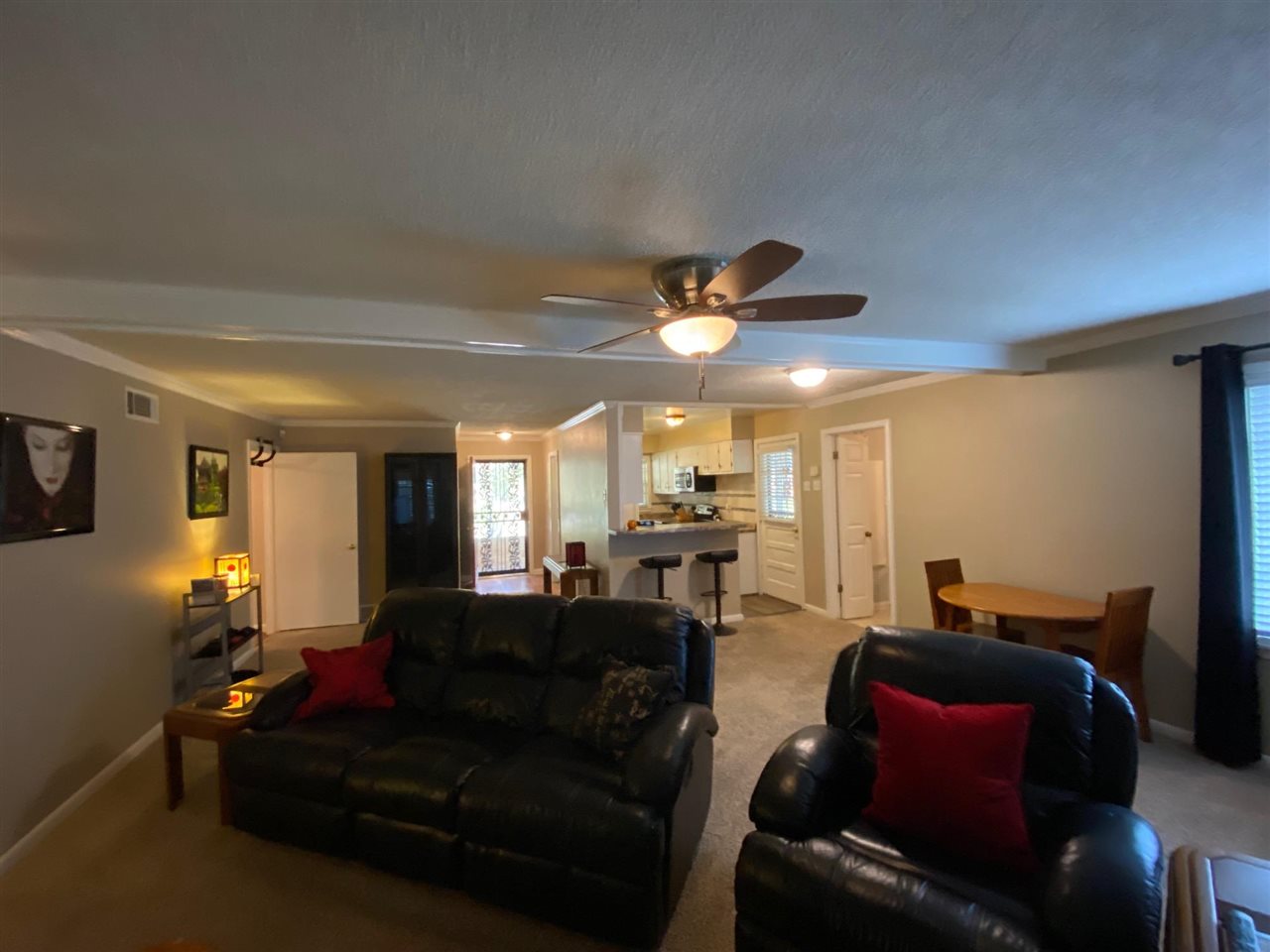1265 Whitewater Road Memphis, TN 38117 - Photo 9 of 23 a living room with furniture and a chandelier