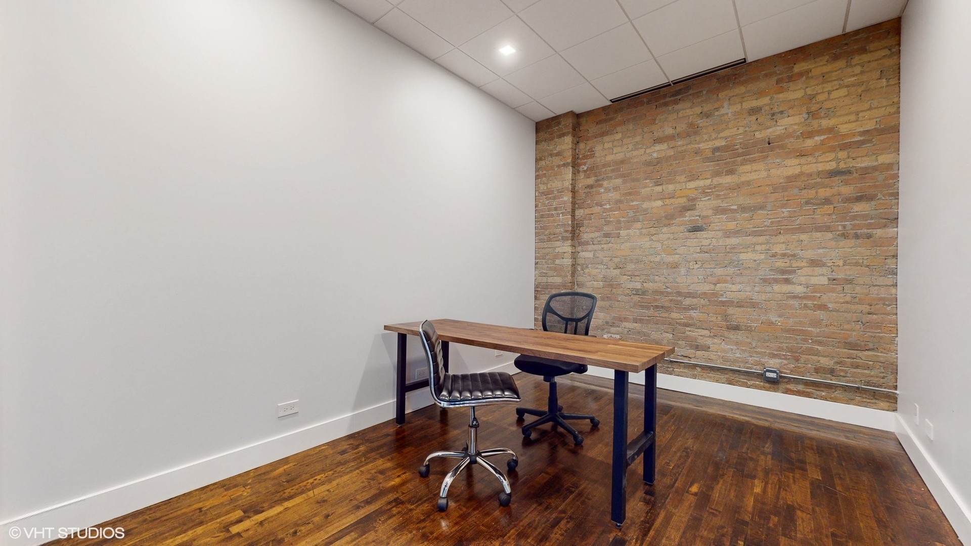 2241 South Wabash Avenue Chicago, IL 60616 - Photo 23 of 91 a view of a workspace with furniture and wooden floor
